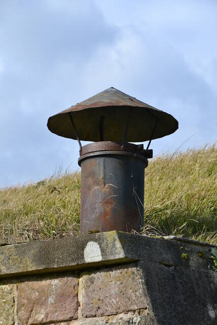 Une cheminée en fonte d'une traverse abri. VAUBOURG Julie